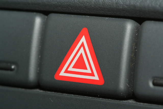 When is it appropriate to use hazard lights? 